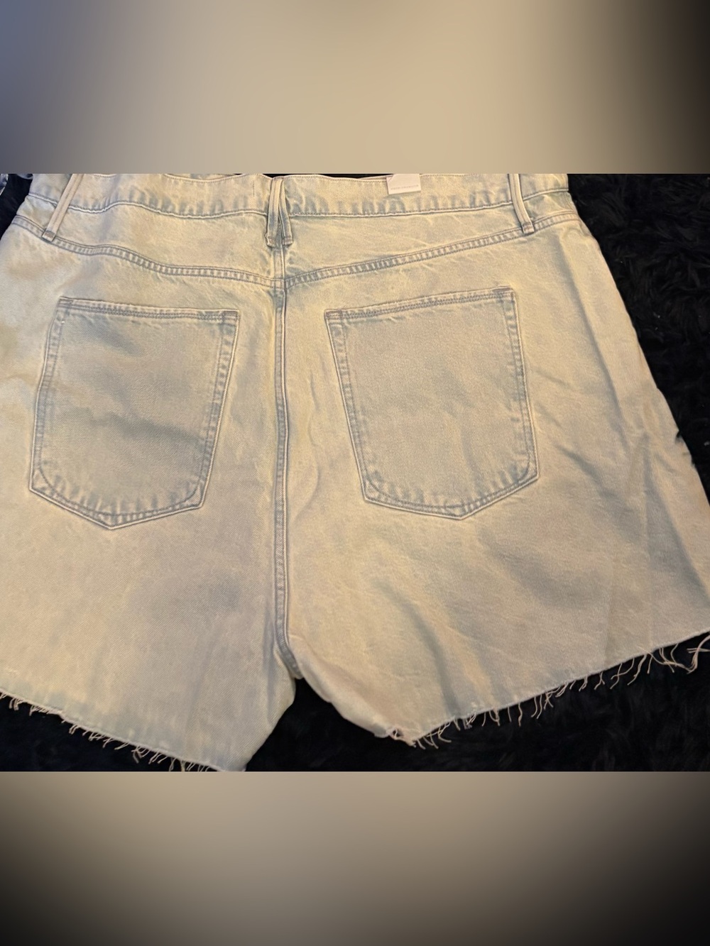 Good American Light Wash Distressed Jean Shorts with Cream Underlay - Picture 2 of 4